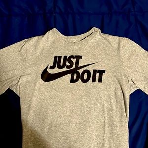 Newly bought Gray Nike shirt. Can be worn as an Adult small and Medium